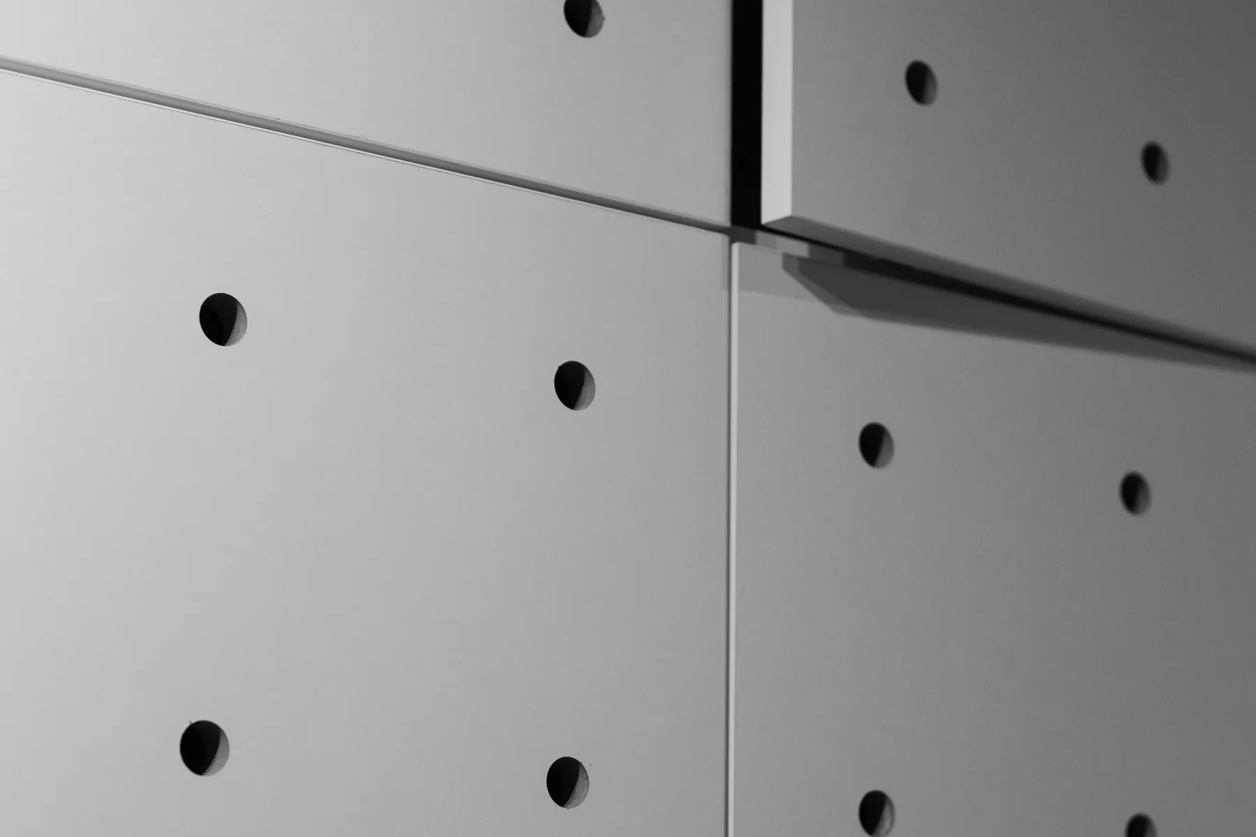 Perforated acoustic wall panels in an interior detail